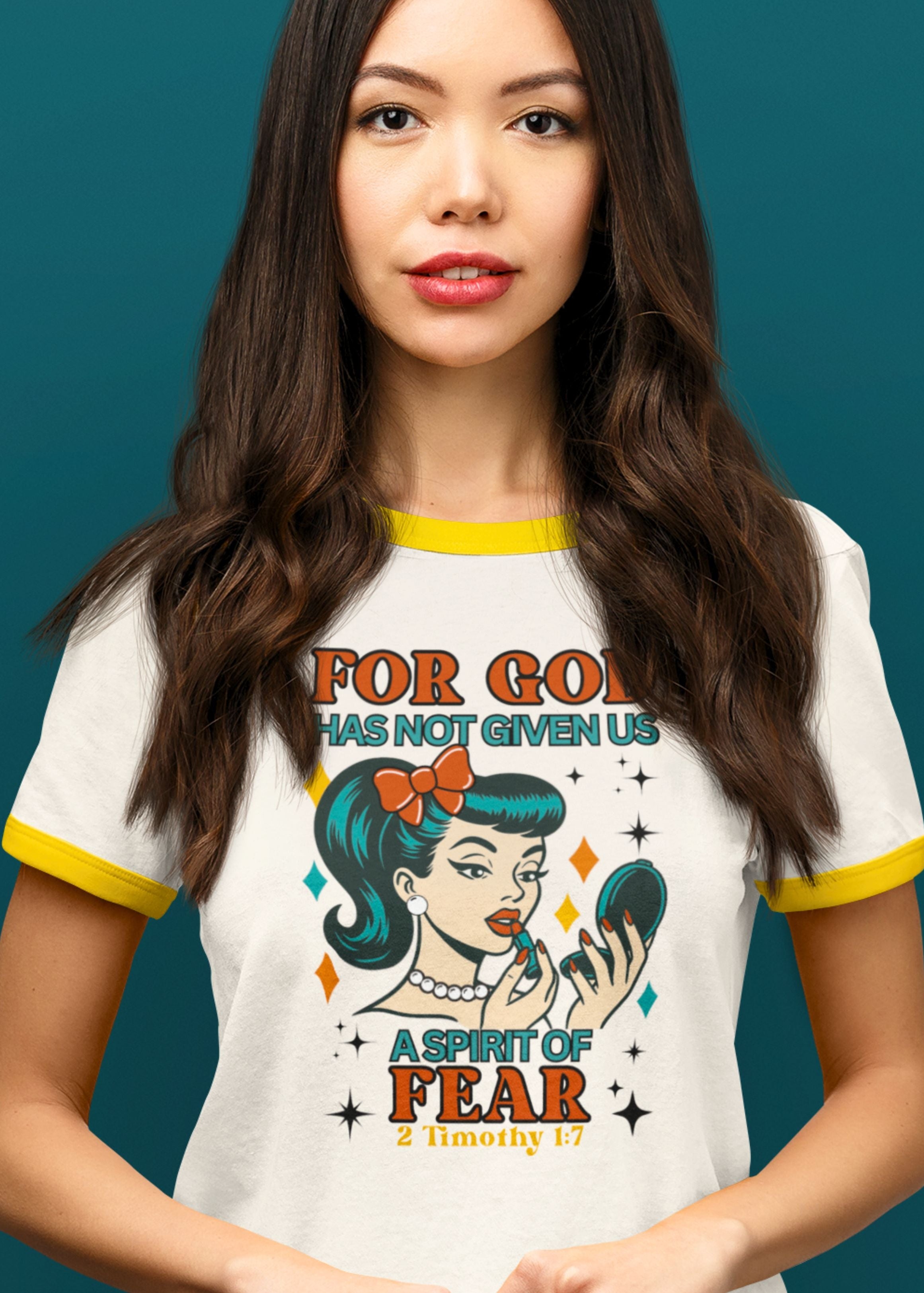 Woman wearing a t-shirt with a graphic design and text on a teal background