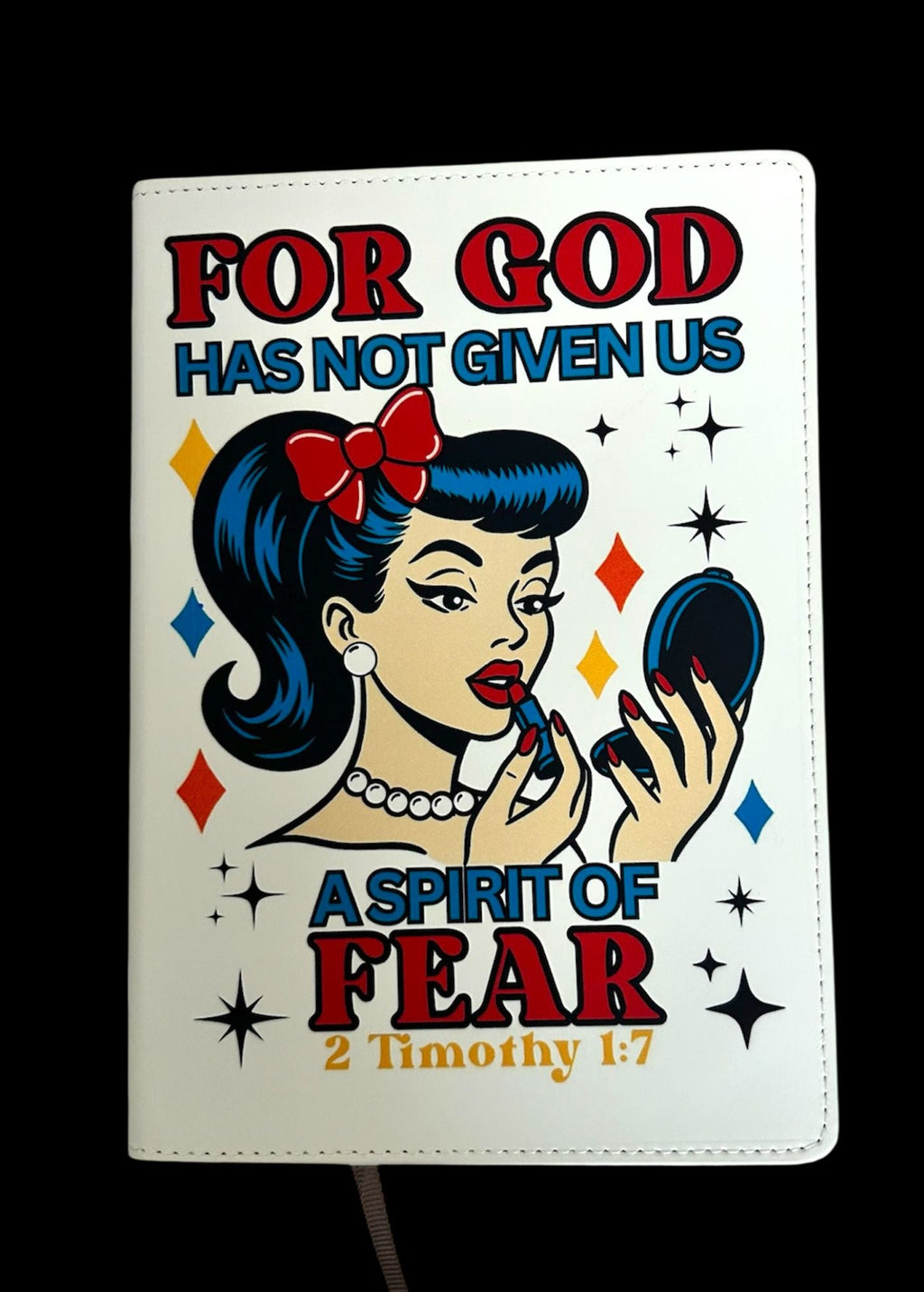 Journal with a design of a woman applying makeup and text on a white background