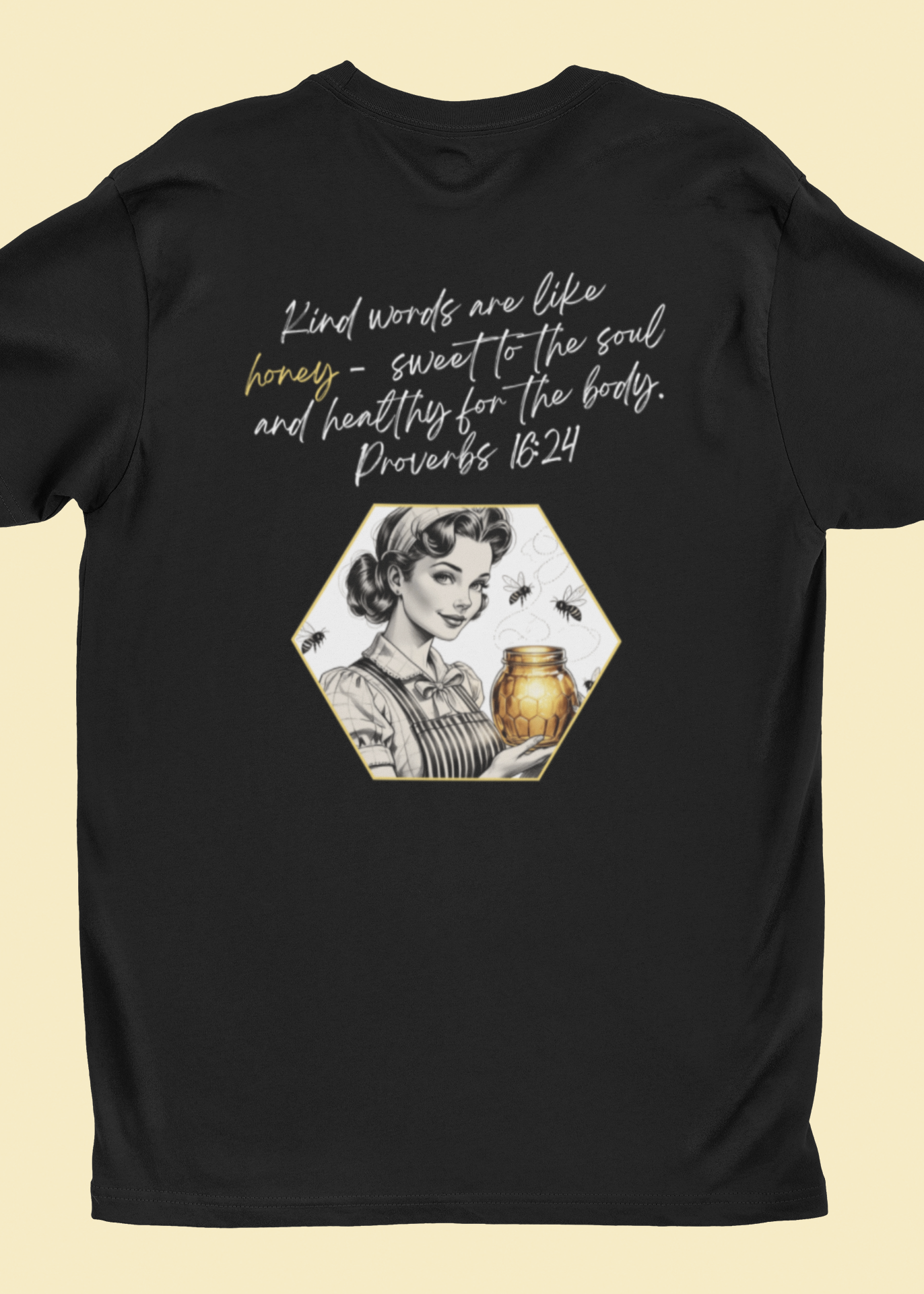 Black Christian graphic black tee. Scripture Proverbs 16:24 is on the back of a black shirt. Retro 40s woman holding a honey jar with bees flying around.