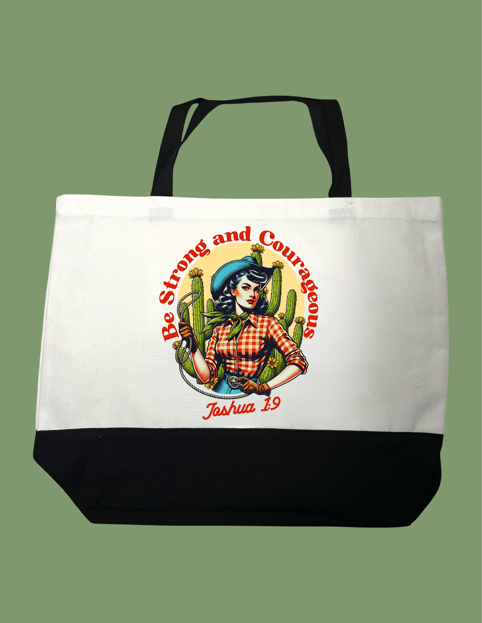 A white canvas tote bag with black handles and a black bottom panel, featuring a retro-style pin-up illustration of a woman with cacti and red text that reads 'Be Strong and Courageous' and 'Joshua 19' on a muted green background.